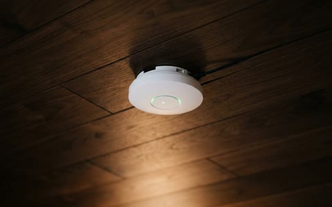 Ceiling-mounted wireless access point with a green status ring